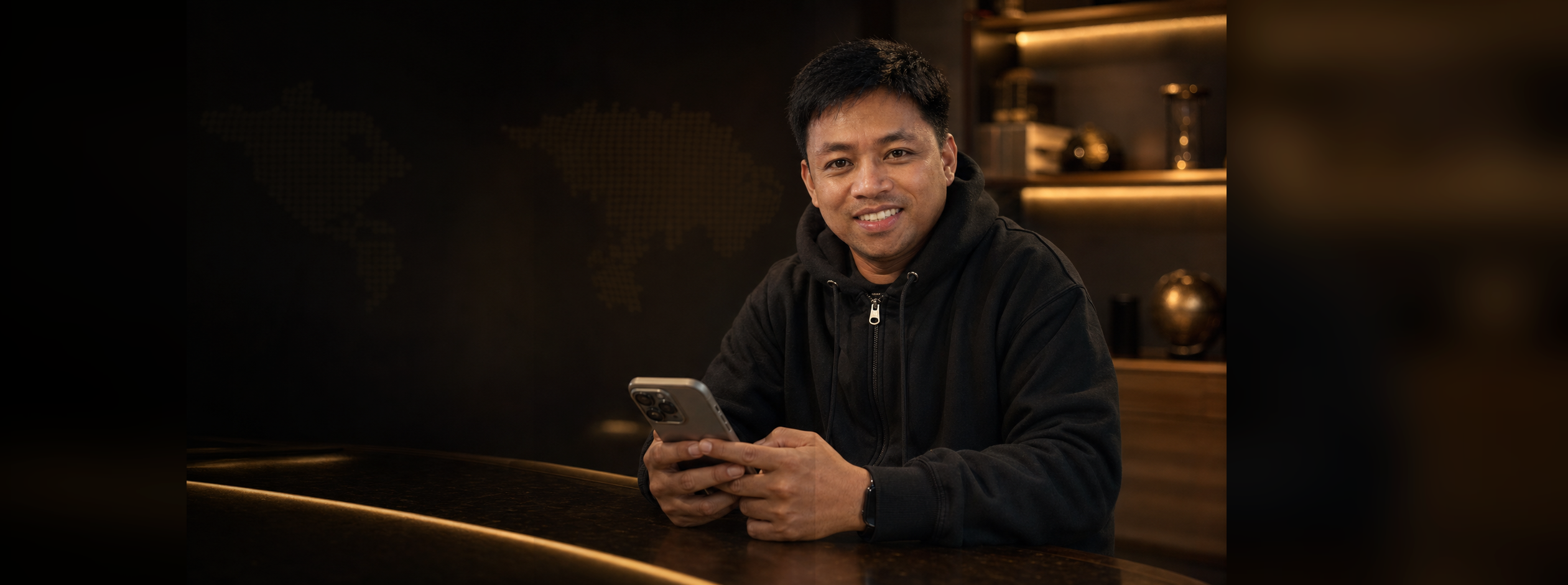 PesoDeOro model using a phone to manage money