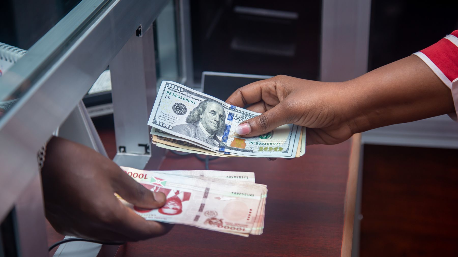 Cash exchange close-up for remittance comparison